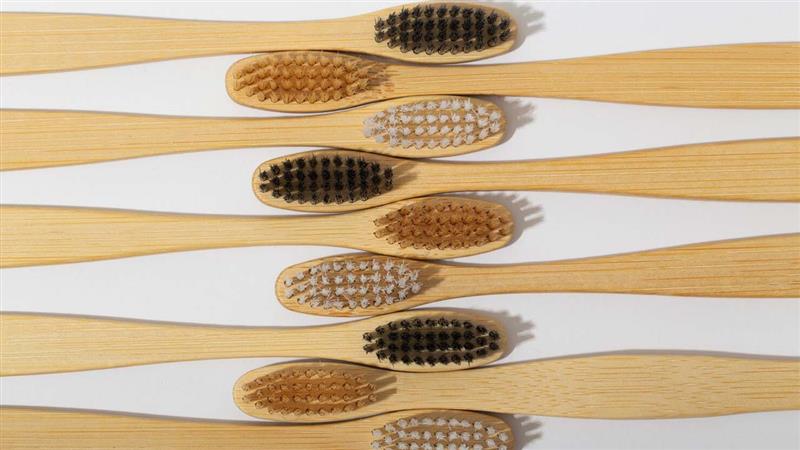 bamboo toothbrush c curve with brown bristles